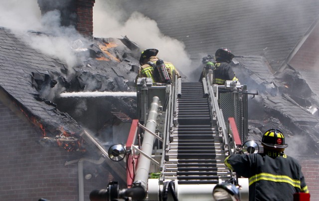 Working the Ladder @ 77 Chestnut Ridge rd Photo courtesy Frank Becerra